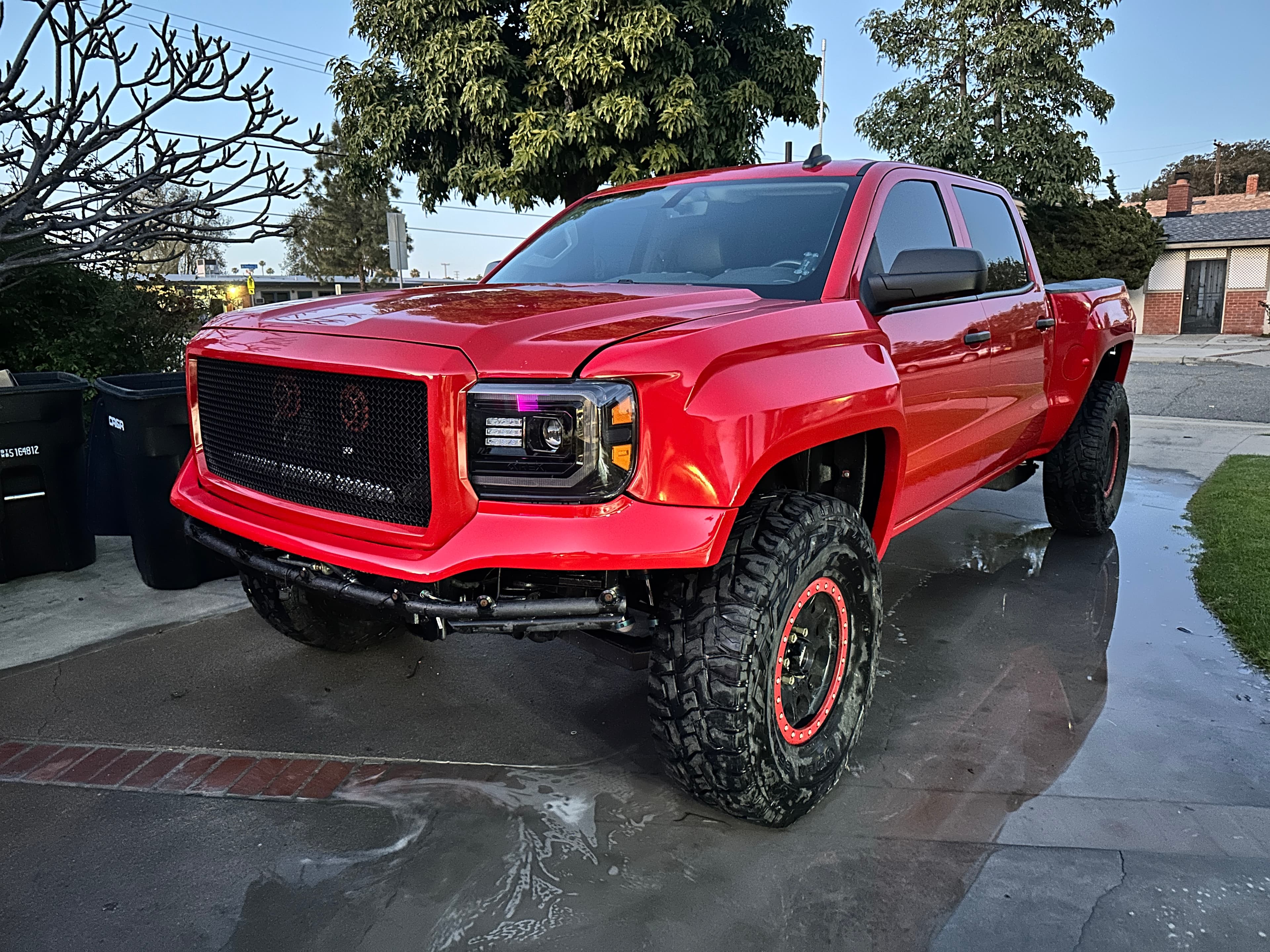 The founder's red 2015 GMC Sierra 1500 with the 416 Whipple combination